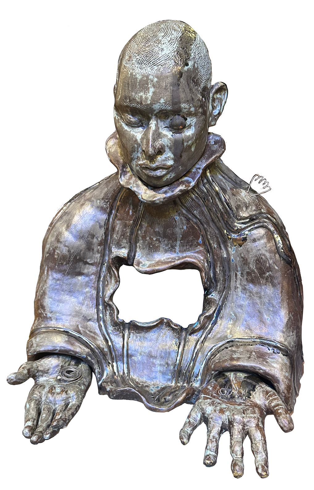 A clay sculpture of a human torso head and hands, with eyes closed, and palms outstretched, a hole in the center of its chest.